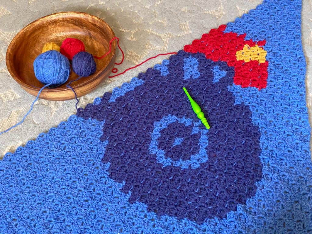 You can make this easy C2C crochet Monster Truck Blanket! Free pattern for any eager beginner. Perfect size for a crib, toddler or twin sized bed. Using Lion Brand Pound of Love yarn. 