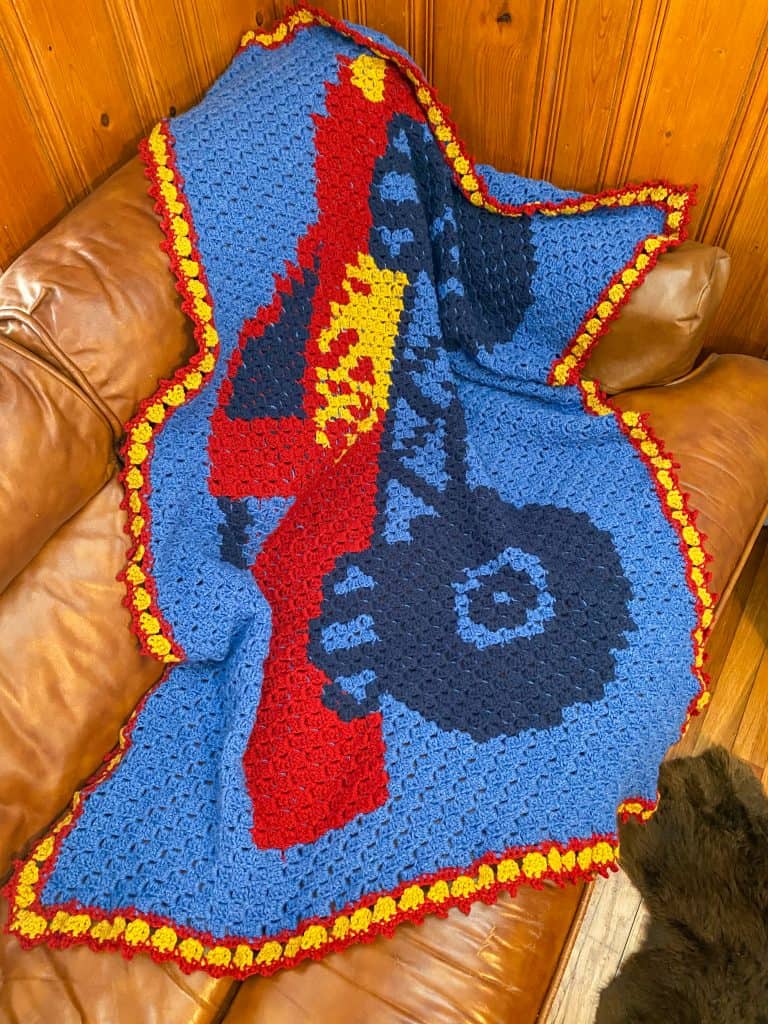 You can make this easy C2C crochet Monster Truck Blanket! Free pattern for any eager beginner. Perfect size for a crib, toddler or twin sized bed. Using Lion Brand Pound of Love yarn. 