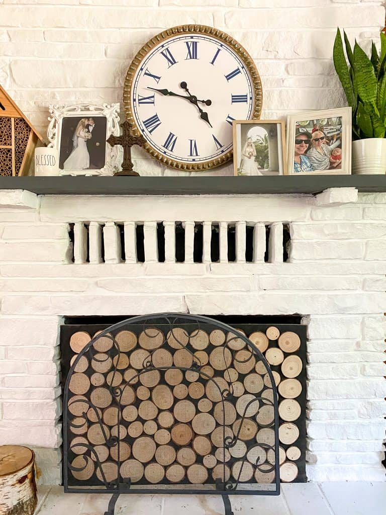 How to make this easy stacked wood looking fireplace you've seen in all the design magazines! Perfect for baby proofing tour fireplace. 