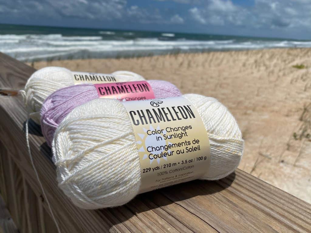 If you've been into Michaels lately you've probably seen this summer's hottest new yarn product... Premier Yarns Chameleon. This yarn is 100% cotton and changes from white to a variety of different colors in the sunlight. But at .99 for only 3.5 oz you have to wonder is it really worth it... I recently bought three skeins and put it to the test and wanted to share my opinion with all you fellow yarn lovers. 