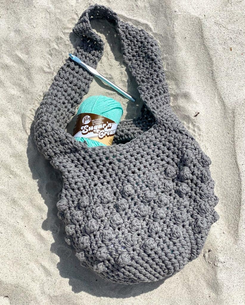The Bobble Hobo Bag FREE Crochet Pattern. Using 2 strands of Lily Sugar n' Cream at once. You'll have this perfect summer bag done in no time and ready for your next adventure!