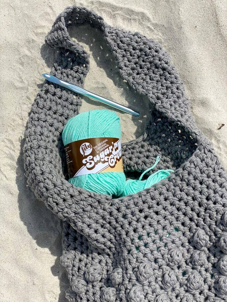 The Bobble Hobo Bag FREE Crochet Pattern. Using 2 strands of Lily Sugar n' Cream at once. You'll have this perfect summer bag done in no time and ready for your next adventure!