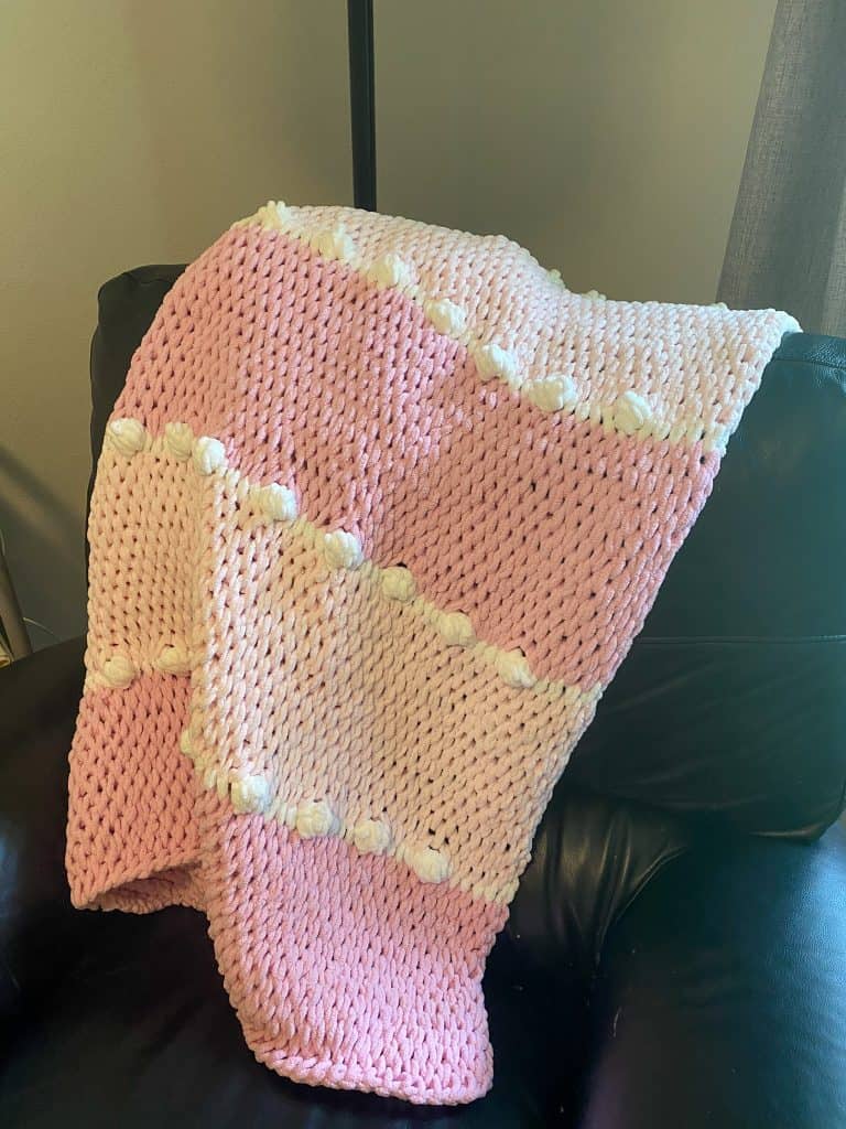How to Crochet the easy Tunisian Full Stitch Blanket with Bobbles Free Crochet Pattern. Using Bernat Baby Blanket Yarn and a size 12mm tunisian crochet hook. 