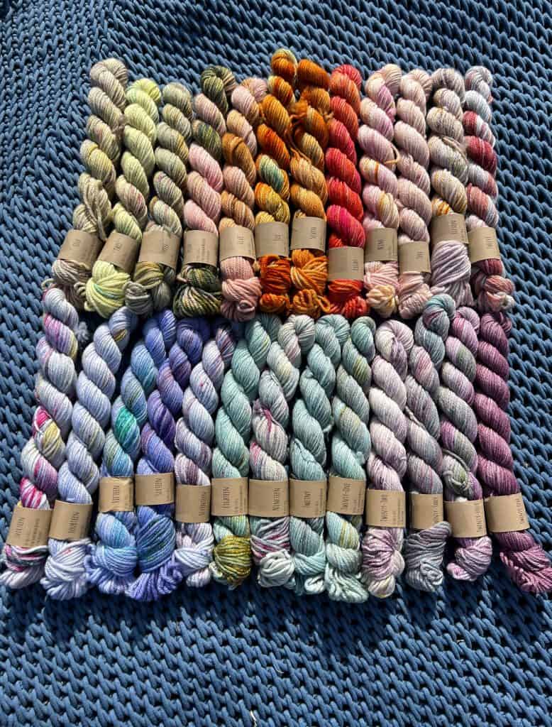 Interested in what the Smalliday Advent Set looks like in 2022? Daily photos of all 25 mini skeins. If you have always wondered what this annual Crazy Beautiful Color set looks like, you are in the correct place!