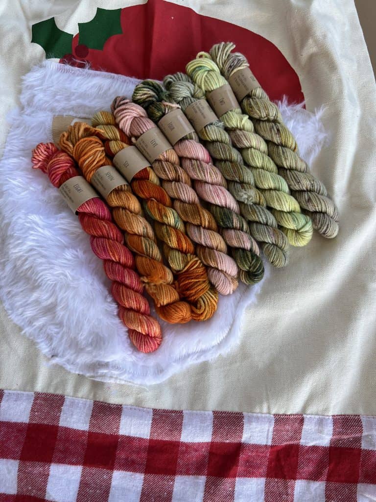 Interested in what the Smalliday Advent Set looks like in 2022? Daily photos of all 25 mini skeins. If you have always wondered what this annual Crazy Beautiful Color set looks like, you are in the correct place!